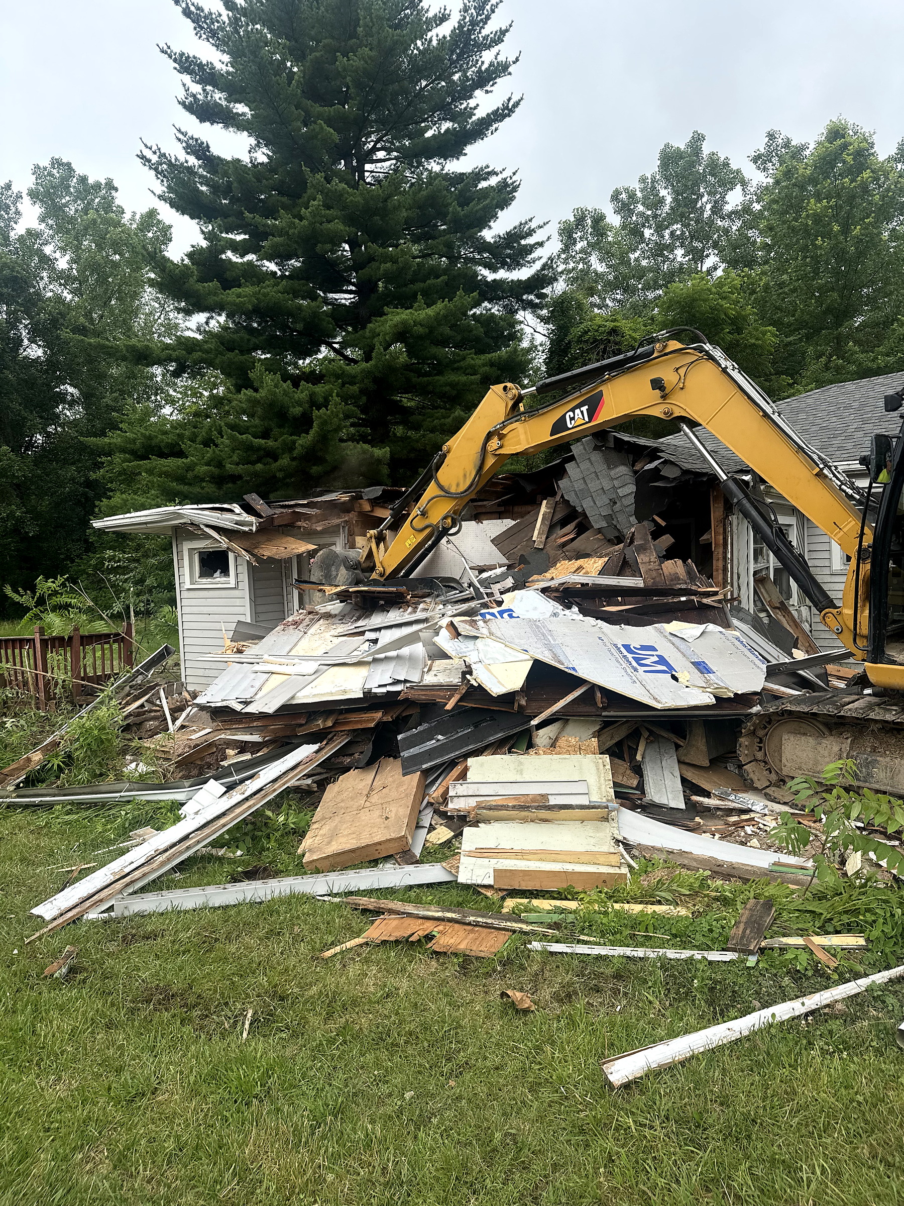Residential structure demolition in progress